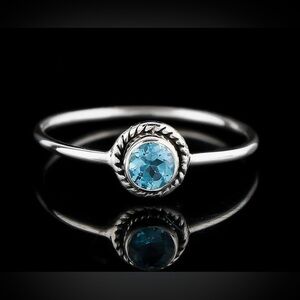 Adorable little 925 Silver Blue Topaz ring size 6